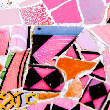 Abstract square bright pink, orange, and blue close-up detail of broken up geometric-shaped tile work at Park Guell by the famed architect Antoni Gaudi color photo fine art print 