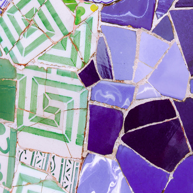 Abstract close-up detail of broken up square blue and green geometric-shaped tile work at Park Guell by the famed architect Antoni Gaudi color photo fine art print 