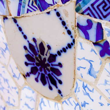 Abstract close-up detail of broken up square blue and white geometric-shaped fine ceramic tile work at Park Guell by the famed architect Antoni Gaudi color photo fine art print 