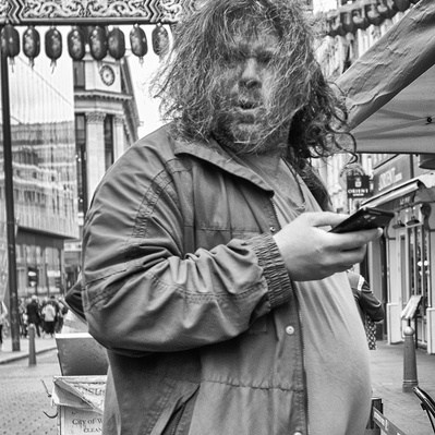 Man in Chinatown, London black-and-white photograph photography