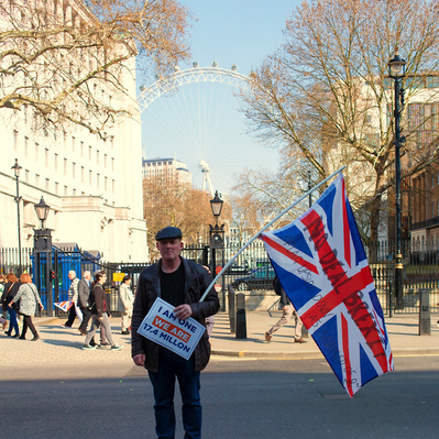 'Pro Brexit Protester, Waving the Union Jack Flag, outside Downing St, Westminster, London Colour Street Photography'