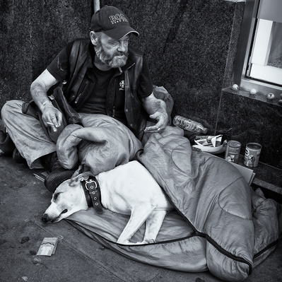 Homeless man and his dog. London Black and White Street Photography