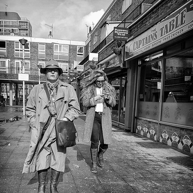 Two ladies walking down the street, popular East London black-and-white photography