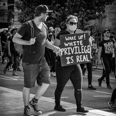 'Protesters waving placards at the Black Lives Matter Protests, Black and White London Street Photography'