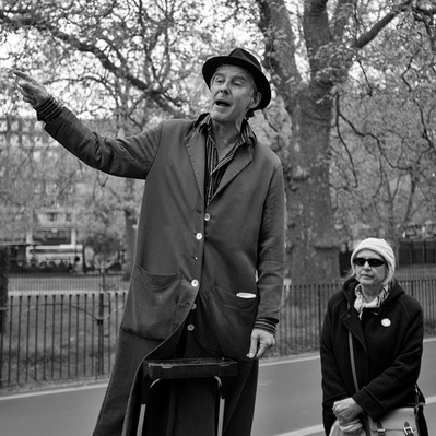 A man preaching speakers corner London black-and-white photography