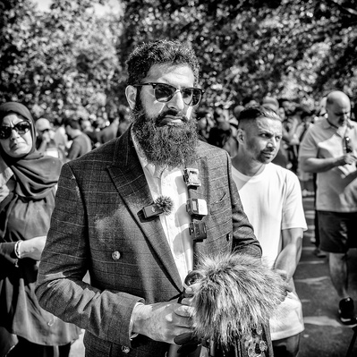 A man reporting from speakers corner London black-and-white photograph photography