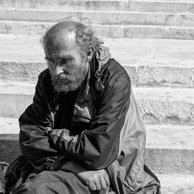 Man in deep thought, Trafalgar Square, London black-and-white photography