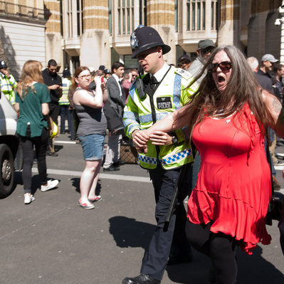 'Met Police Officers arrest a woman EDL Protester, London Colour Street Photography'