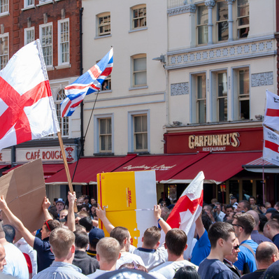 'EDL Protests waving flags, London Colour Street Photography'