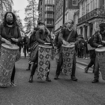 'Kill the Bill protesters Playing drums along Park Lane, London Street Photography Black and White'