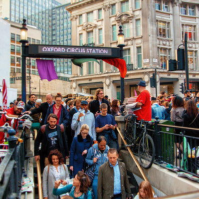 'People entering a tube station at rush hour in central london, London Street Photography Colour'