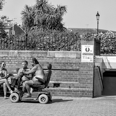 Group of people having a chat, Worthing Sussex black-and-white photography