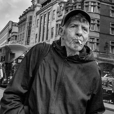 A man returning from a hard days work London black-and-white photography