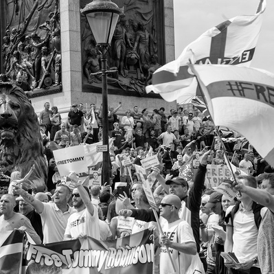 'Tommy Robinson Supporters in Trafalgar Square, London Black and White Street Photography'