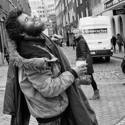 Rough sleeper shouting London black-and-white photography