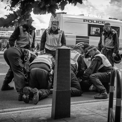 'Met Police Officers Pin down a protester at the Black Lives Matter protest, Black and White London Street Photography'