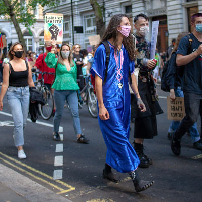 'Black Lives Matter protesters walking through the streets of London holding placards, London Colour Street Photography'