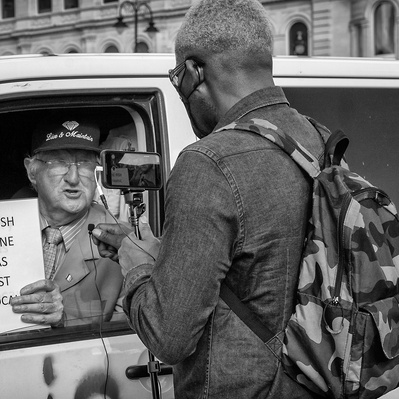 'A protester talking to the media in Trafalgar Square at the Black Lives Matter Protest, London Black and White Street Photography'
