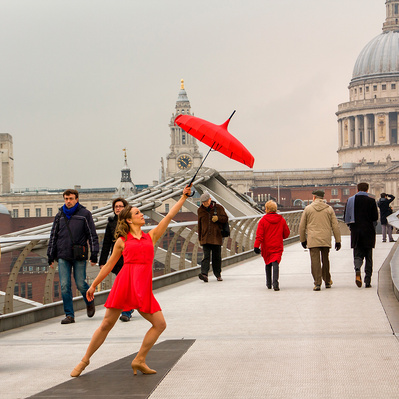 A model posing on the millennium bridge London colour photography