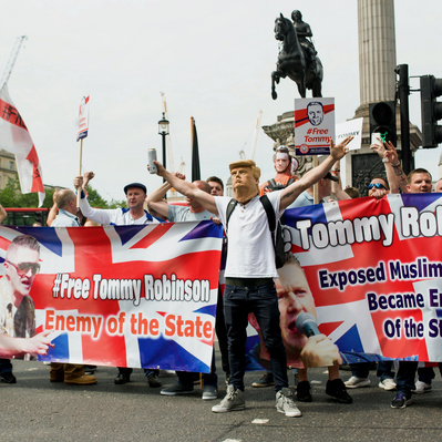'Tommy Robinson Protests, Protester wearing a Donald Trump Mask, London Colour Street Photography'
