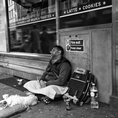 A man looks out in total despair, London black-and-white photography