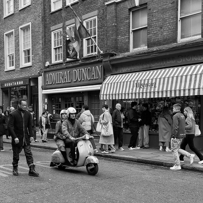 Street life old Compton Street, Soho, London black-and-white photography