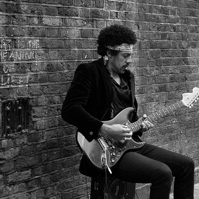 'Street performer dressed as jimi hendix, Black & White London Street Photography'