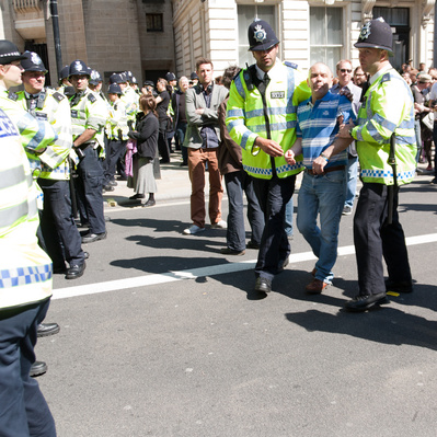'Met Police Officers arrest a man at the EDL Protests, London Colour Street Photography'