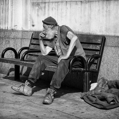 A man enjoyed his cigarette, colliers wood South London black-and-white photography