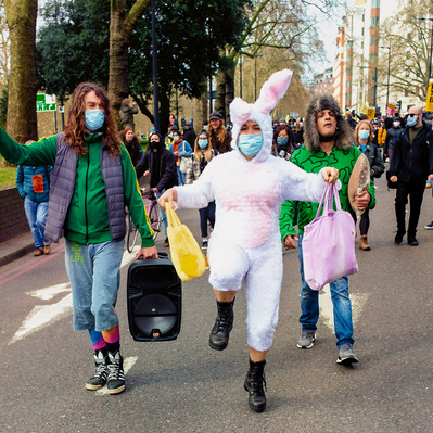 'Kill the Bill Protester dressed as an Easter Bunny, Park Lane, London Street Photography Colour'