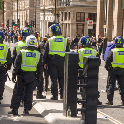 'A group of Met Police Officers taking a break from the Black Lives Matter Protests, London Colour Street Photography'