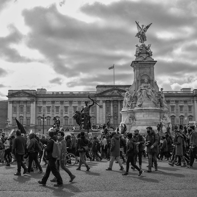'Kill the Bill protesters walk past Buckingham Palace, London Street Photography Black and White'