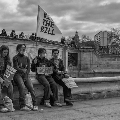'Four Young Kill the Bill Protesters outside Buckingham Palace, London Street Photography Black and White'