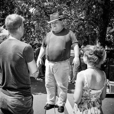 Man standing on his stall speakers corner London black-and-white photography