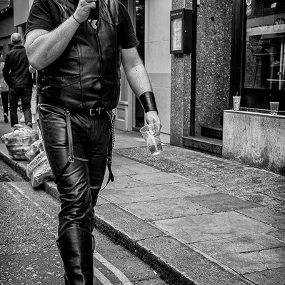 Guy dressed in leather old Compton Street, Soho, London black-and-white photography