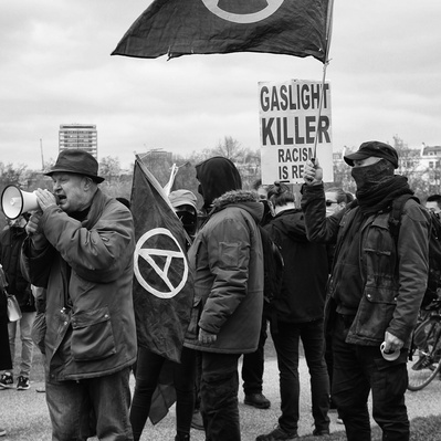 'Kill the Bill Protester on his megaphone in Hyde Park, London Street Photography Black and White'