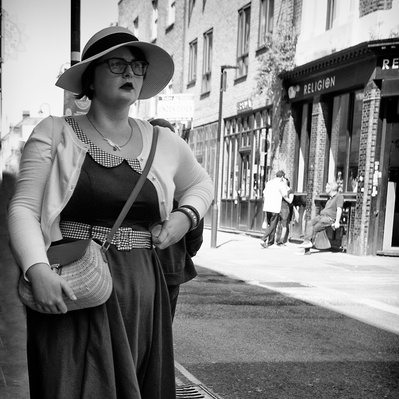 'Retro girl walking along the street, Black & White London Street Photography'
