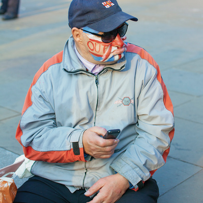 'Pro Brexit Protester sits outside Westminster, London Colour Street Photography'