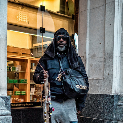 A black man dressed as a warrior Whitehall London colour photography