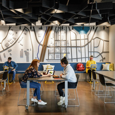 A modern workplace in Denver, highlighting contemporary furnishings, open layout, and thoughtful design elements that promote productivity and a professional, inviting atmosphere.
