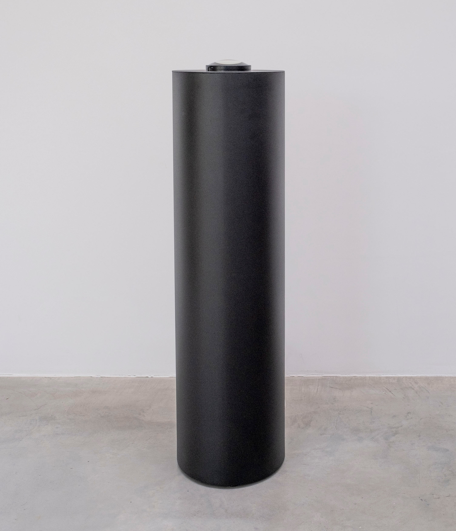 The installation view of the Black Tube video work by Ákos Rajnai.