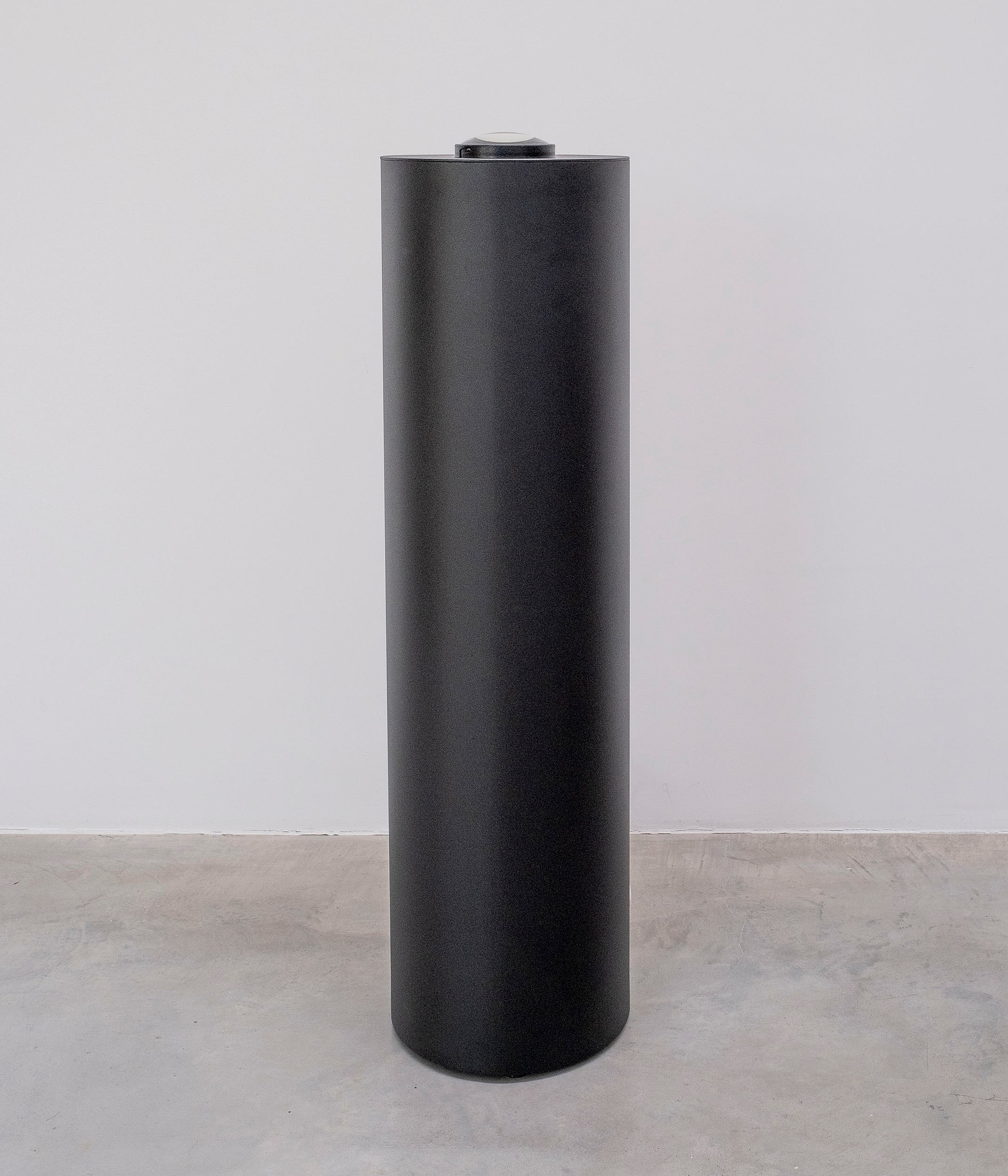 The installation view of the Black Tube video work by Ákos Rajnai.