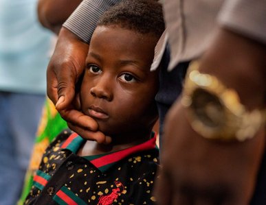 Kasa Joseph, 3, was born in a Tanzanian refugee camp where his father and family lived for nearly 20 years fleeing war in their home country. The entire time Joseph, Kasa's father, waited in the refugee camp he was working through the international immigr