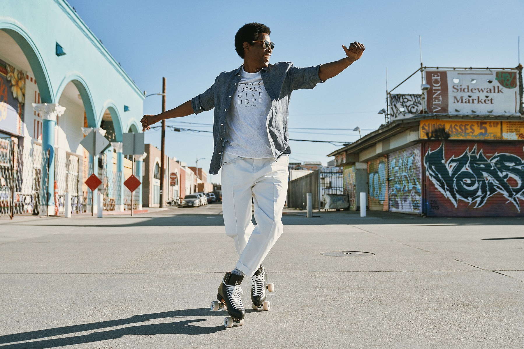 Roller skating in Venice Beach Los Angeles California for a photo shoot fashion brand campaign for Brunello Cucinelli