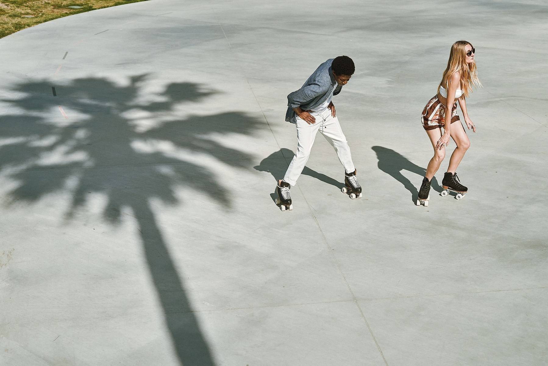 Roller skating in Venice Beach Los Angeles California for a photo shoot fashion brand campaign for Brunello Cucinelli