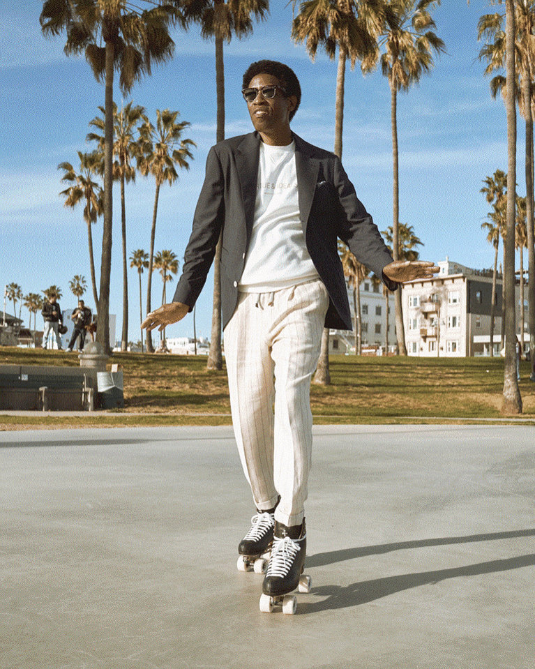 Roller skating in Venice Beach Los Angeles California for a photo shoot fashion brand campaign for Brunello Cucinelli