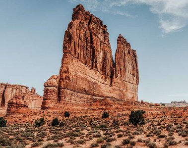 A mitten shaped rock formation in the Utah desert at Arches National Park