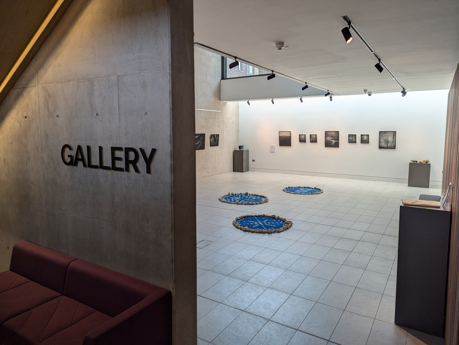 Dave Tipper's photography in an art gallery in Winchester, England, UK.