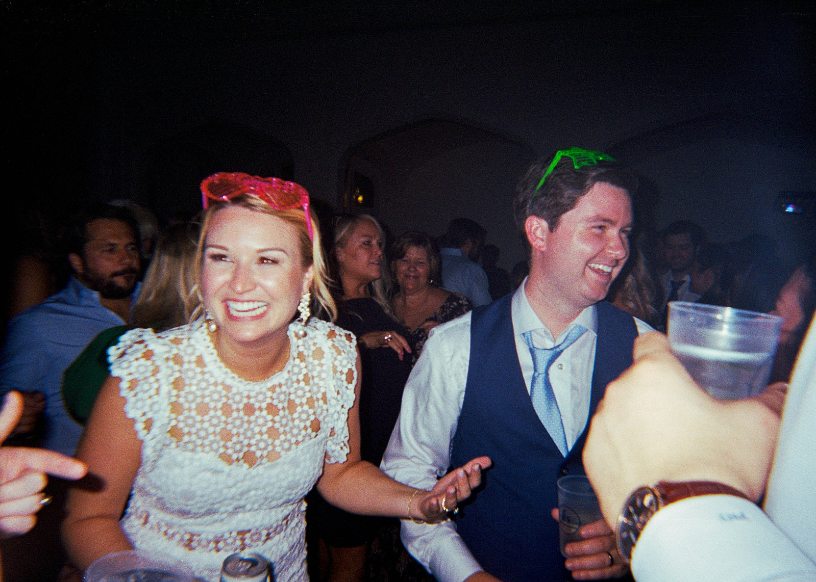 Fun wedding party vibes. Captured on retro film. Colorful and fun wedding photography.
