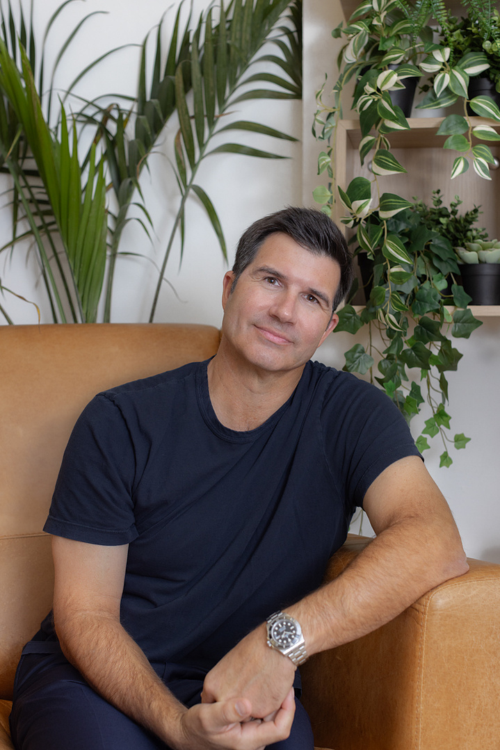 A contemporary, professional headshot with a clean background, ideal for business professionals looking to enhance their LinkedIn or social media profiles.